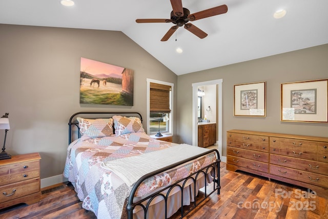 bedroom with ensuite bathroom, ceiling fan, dark hardwood / wood-style flooring, and lofted ceiling