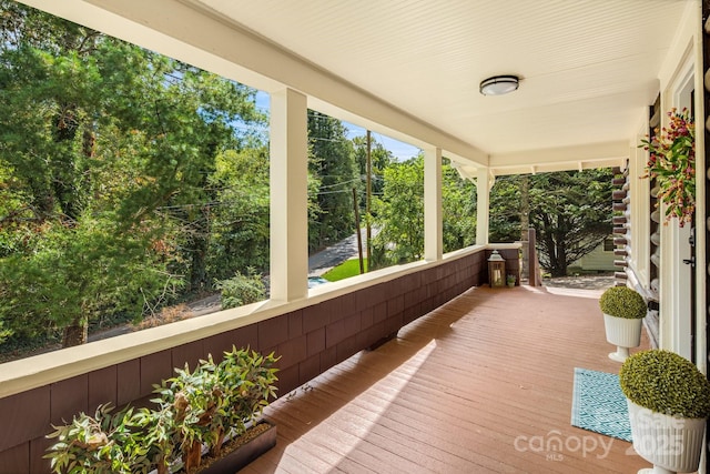 wooden terrace with covered porch