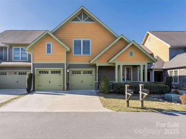 craftsman house with a garage