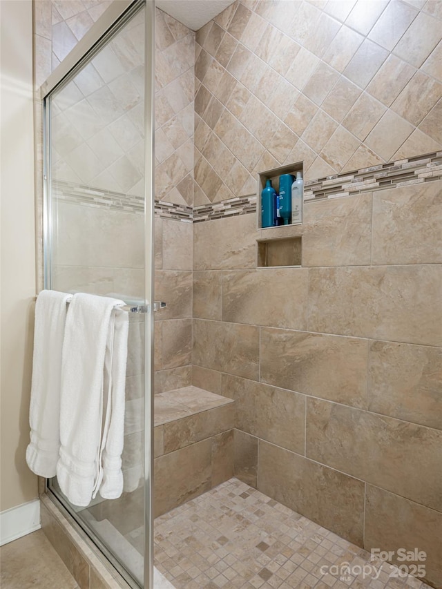 bathroom featuring an enclosed shower