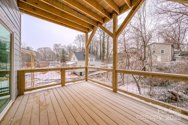 view of snow covered deck