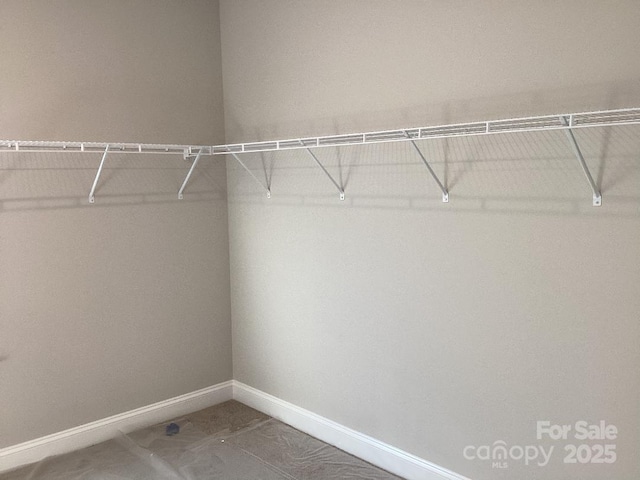 walk in closet featuring tile patterned floors