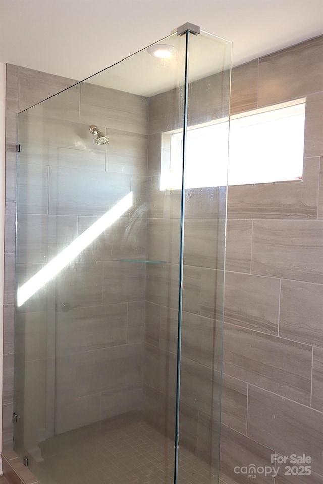 full bathroom with a stall shower