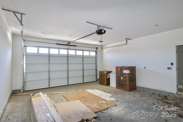 garage featuring a garage door opener