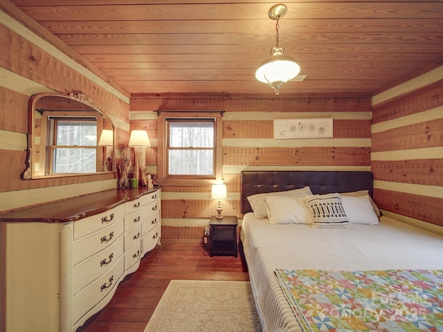 bedroom featuring wood ceiling, dark hardwood / wood-style flooring, and wood walls