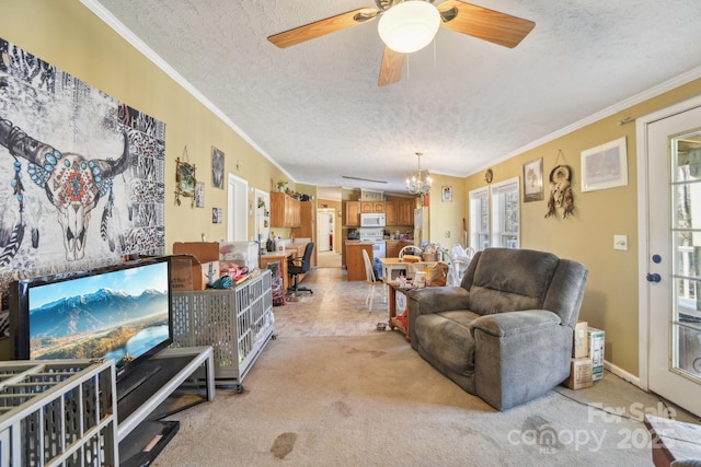 living room with light carpet, crown molding, ceiling fan with notable chandelier, and a textured ceiling