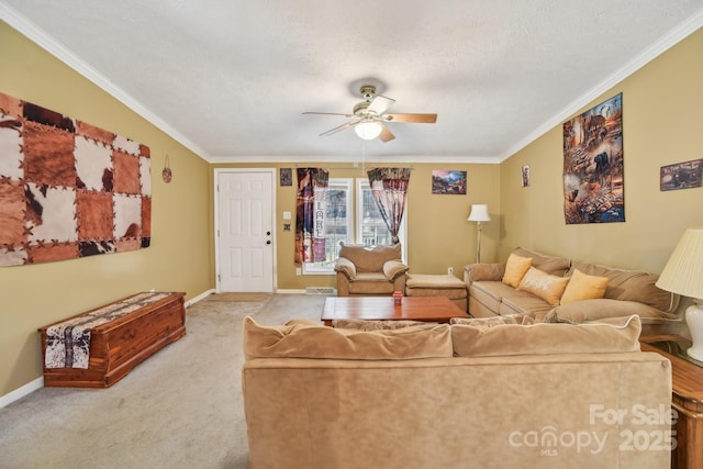 carpeted living room with ceiling fan, ornamental molding, and a textured ceiling