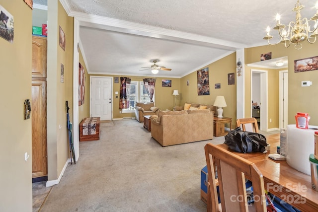 living room with ornamental molding, ceiling fan with notable chandelier, light carpet, and a textured ceiling