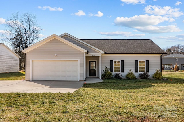 ranch-style house featuring a front lawn and a garage