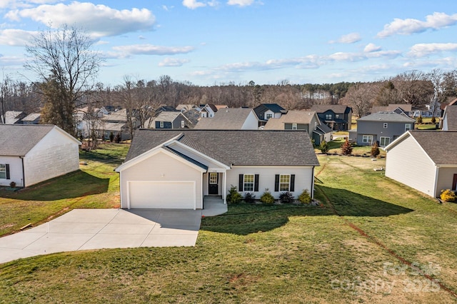 view of front of property featuring a garage and a front lawn