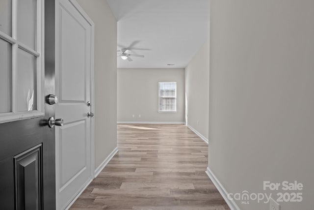 hallway featuring light hardwood / wood-style floors