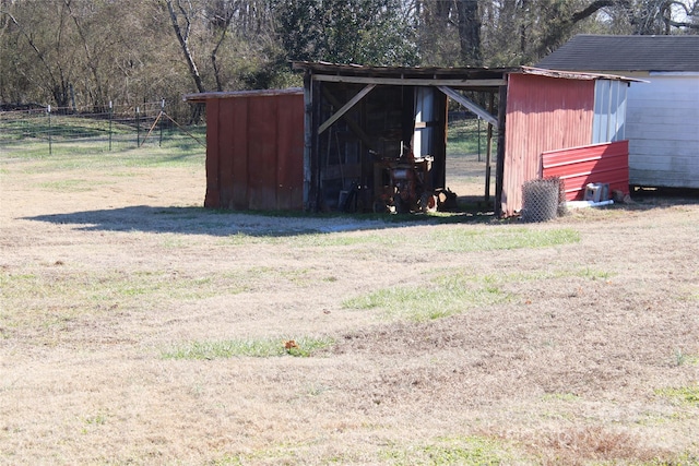 view of outdoor structure with a yard