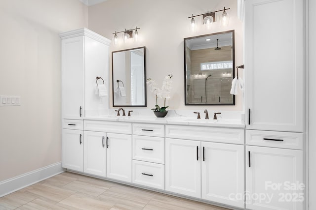 bathroom with vanity and a shower