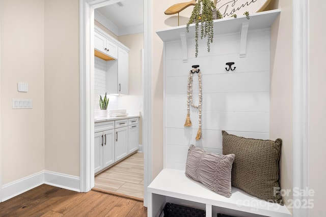 mudroom with light wood-type flooring