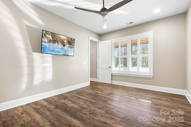 unfurnished room with wood-type flooring and ceiling fan