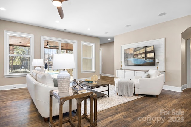 living room with dark hardwood / wood-style floors