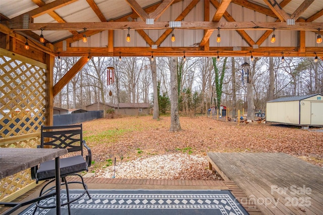 exterior space with a gazebo and a storage unit