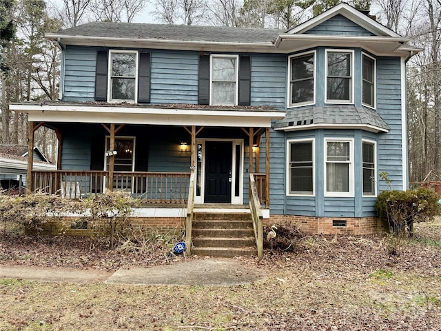 view of front of property featuring covered porch