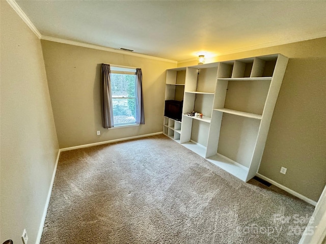 interior space featuring carpet flooring and ornamental molding