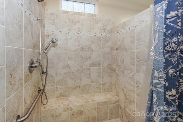 bathroom featuring curtained shower