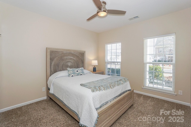 bedroom with ceiling fan and carpet