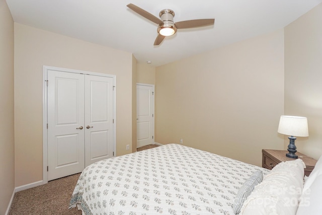 carpeted bedroom with a closet and ceiling fan