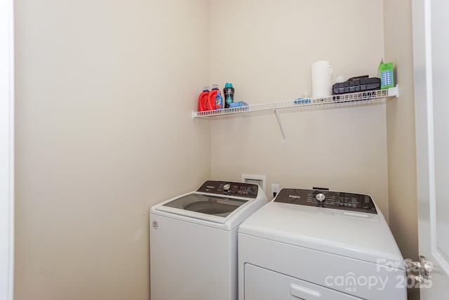 laundry area with washer and dryer