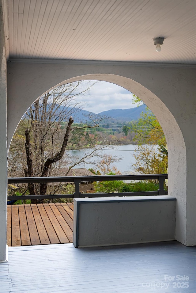 exterior space featuring a water and mountain view