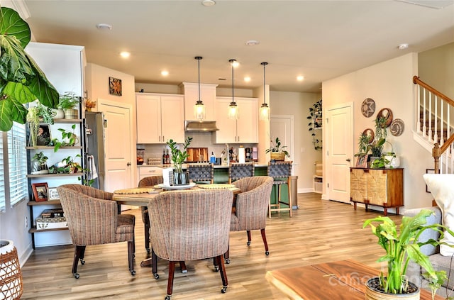 dining room featuring light wood-type flooring