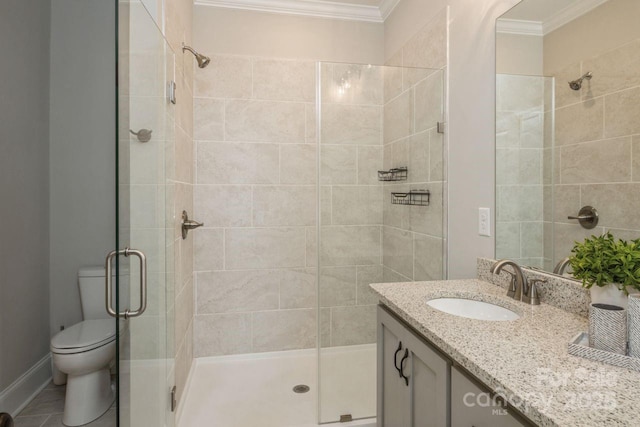 bathroom featuring toilet, a shower with door, tile patterned floors, ornamental molding, and vanity