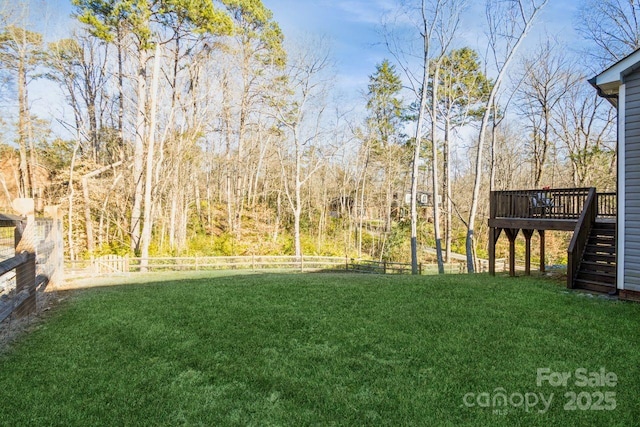 view of yard with a deck