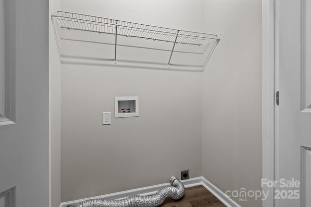 laundry area with hookup for a washing machine, hardwood / wood-style floors, and electric dryer hookup