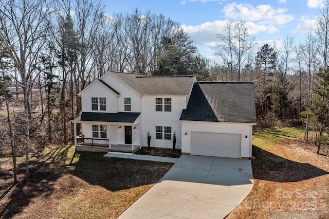 front of property with a garage and a porch