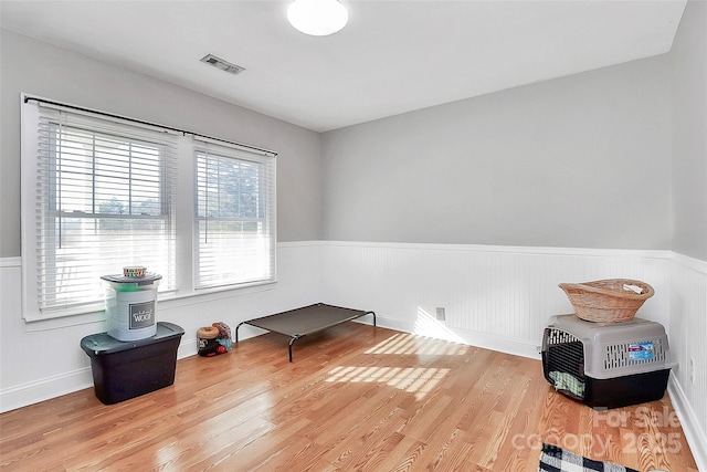 living area with wood-type flooring