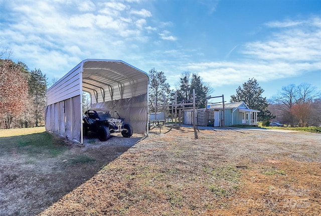 view of yard with a carport