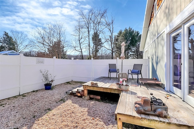 view of yard with a wooden deck