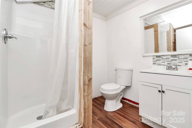 bathroom with curtained shower, backsplash, hardwood / wood-style flooring, vanity, and toilet