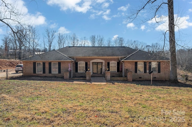 ranch-style house with a front yard