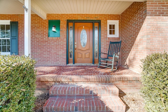 entrance to property with a porch