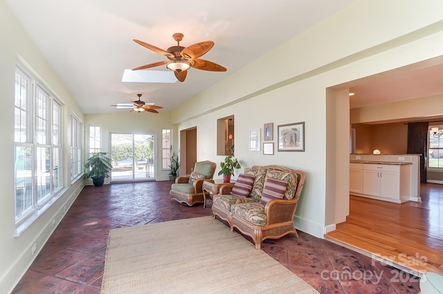 sunroom featuring ceiling fan