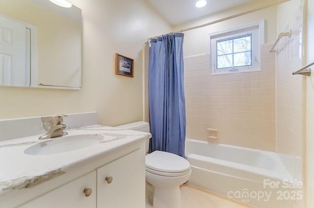 full bathroom with vanity, toilet, and shower / bath combo