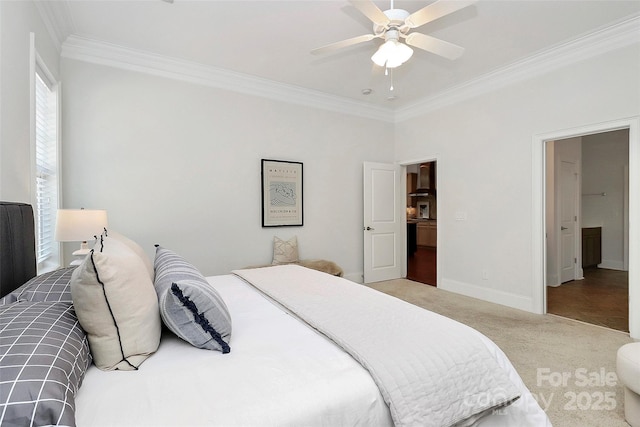 bedroom featuring ceiling fan, crown molding, and carpet flooring