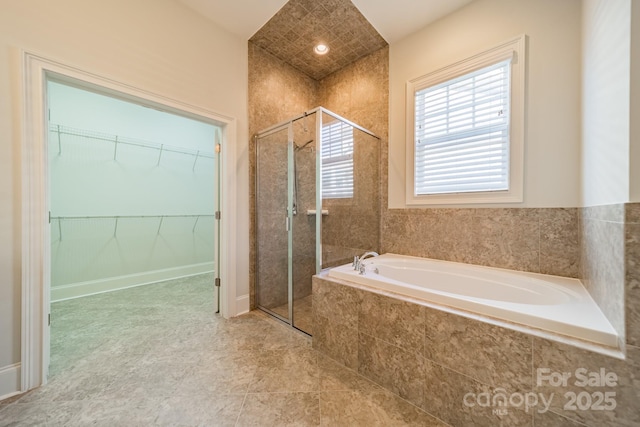 bathroom with independent shower and bath