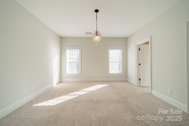 view of carpeted spare room