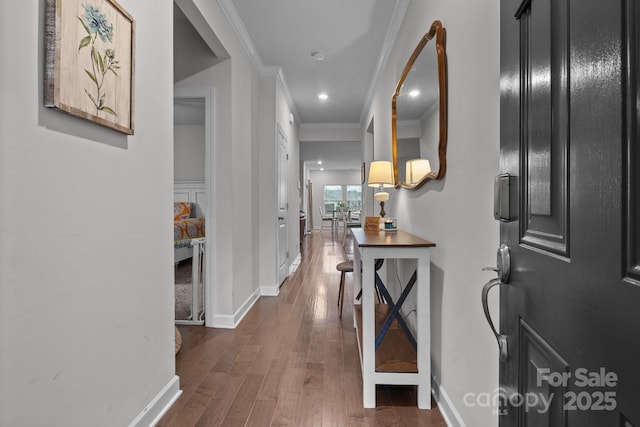 corridor featuring crown molding and dark wood-type flooring