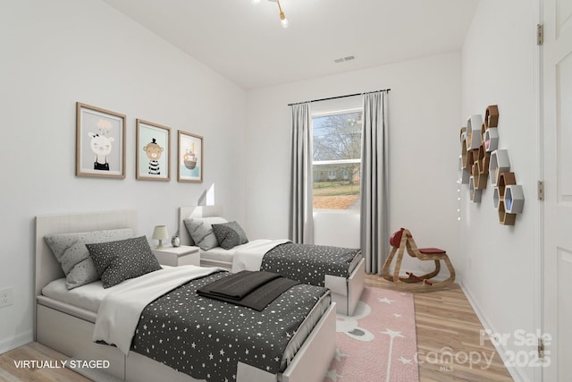 bedroom featuring light hardwood / wood-style flooring