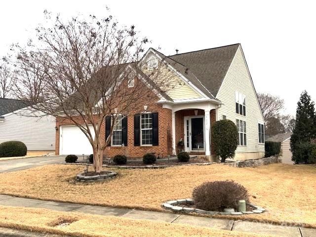 front of property with a garage