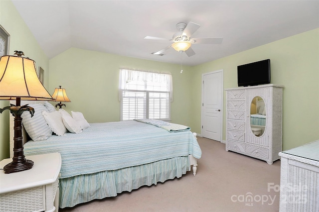 bedroom featuring light carpet, ceiling fan, and lofted ceiling