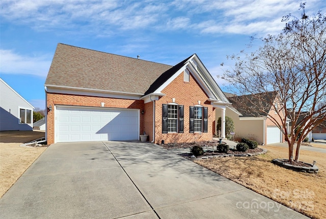 view of front of property with a garage