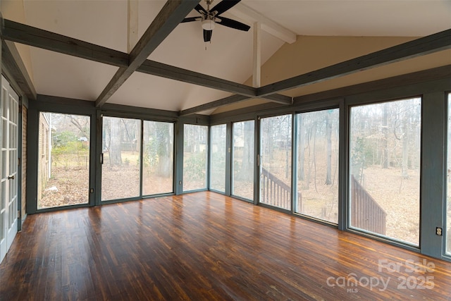 unfurnished sunroom with a healthy amount of sunlight, lofted ceiling with beams, and ceiling fan